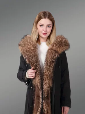 Women’s elegant brown parka with soft raccoon fur hood and long collar