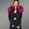 Women’s solid long black parka with maroon raccoon fur hood